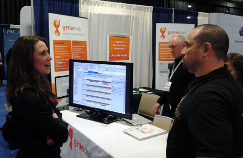 salesman speaking with scientist at a conference