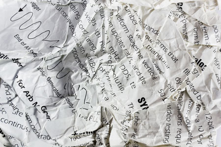 crumpled scientific journal article
