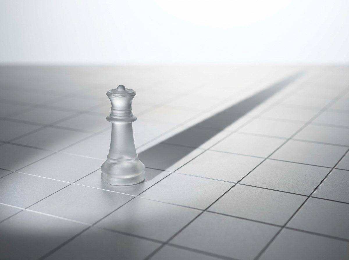 A frosted glass chess piece on a subtle grid surface casting a sharp, long shadow.